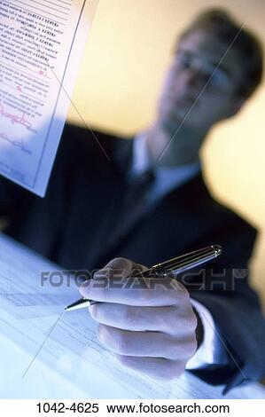 Stock Photography - pen, desk, paperwork, signing, business, writing. Fotosearch