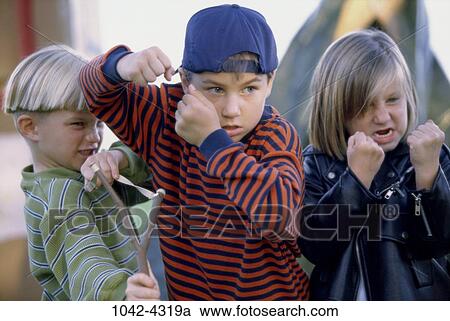 people, anger, defensive, outdoors, friends, children View Large Photo Image Stock Image - people, anger, defensive, outdoors, friends, children. Fotosearch
