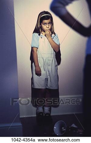 Stock Image - people, anger, girl, fear, confrontation, child, angry. Fotosearch