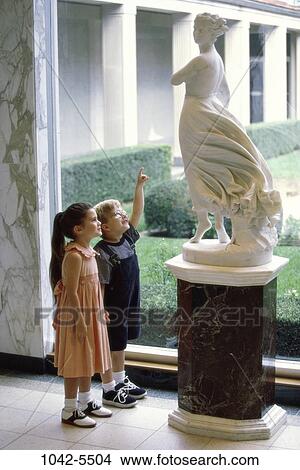 Picture - people, art, sculpture, curious, statue, children, museum. Fotosearch