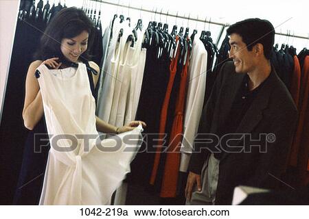 people, Asian, couple, dress, shopping, fitting, clothes View Large Photo Image Stock Image - people, Asian, couple, dress, shopping, fitting, clothes. Fotosearch