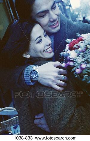 Stock Image - people, Asian, couple, flowers, lifestyles, outdoors, adventurous. Fotosearch