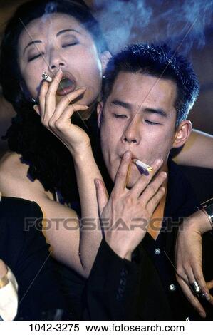 people, Asian, couple, smoking, indulgence, vice View Large Photo Image Stock Photography - people, Asian, couple, smoking, indulgence, vice. Fotosearch
