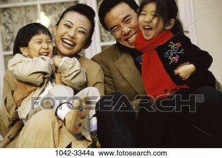 people, Asian, happy, laughing, outdoors, jackets View Large Photo Image Stock Image - people, Asian, happy, laughing, outdoors, jackets. Fotosearch