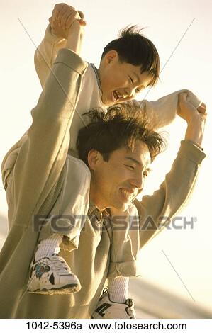 people, Asian, riding, playful, outdoors, carrying, family View Large Photo Image Stock Image - people, Asian, riding, playful, outdoors, carrying, family. Fotosearch