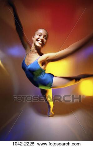people, balance, woman, smiling, Hispanic, happy, individual View Large Photo Image Stock Photography - people, balance, woman, smiling, Hispanic, happy, individual. Fotosearch