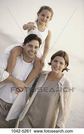 people, beach, pointing, point, carrying, family, daughter View Large Photo Image Stock Image - people, beach, pointing, point, carrying, family, daughter. Fotosearch