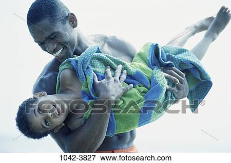 people, beach, swinging, holding, swing, twirling, carrying View Large Photo Image Stock Photo - people, beach, swinging, holding, swing, twirling, carrying. Fotosearch