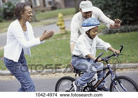 people, bicycle, helmet, riding, outdoors, achievement View Large Photo Image Picture - people, bicycle, helmet, riding, outdoors, achievement. Fotosearch