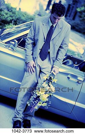 Stock Image - people, blue, car, flowers, outdoors, defeat. Fotosearch