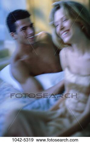 people, blur, couple, bed, laughing, playful, motion View Large Photo Image Stock Photo - people, blur, couple, bed, laughing, playful, motion. Fotosearch