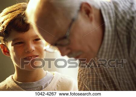 people, blur, eyeglasses, watch, watching, family, admiring View Large Photo Image Stock Photo - people, blur, eyeglasses, watch, watching, family, admiring. Fotosearch