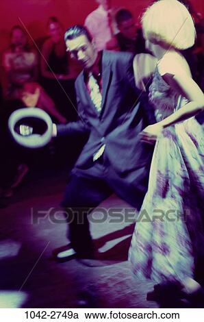 people, blur, hat, couple, dancing, dress, motion View Large Photo Image Stock Image - people, blur, hat, couple, dancing, dress, motion. Fotosearch