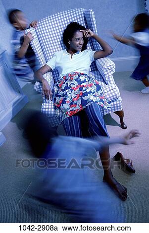 people, blur, home, playing, sitting, mother, overwhelmed View Large Photo Image Stock Image - people, blur, home, playing, sitting, mother, overwhelmed. Fotosearch
