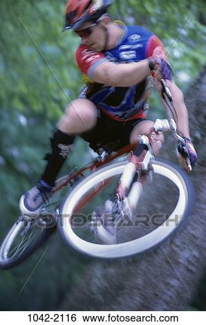 people, blur, jump, jumping, bicycle, helmet View Large Photo Image Stock Photograph - people, blur, jump, jumping, bicycle, helmet. Fotosearch