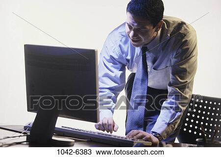 people, computer, business, businessman, indoors View Large Photo Image Stock Image - people, computer, business, businessman, indoors. Fotosearch