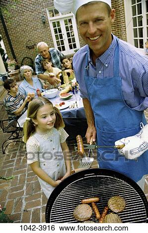 people, cooking, outdoors, family, anticipation, generations, food View Large Photo Image Stock Photograph - people, cooking, outdoors, family, anticipation, generations, food. Fotosearch