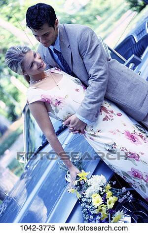people, couple, car, flowers, outdoors, romantic, Middle-aged View Large Photo Image Stock Photography - people, couple, car, flowers, outdoors, romantic, Middle-aged. Fotosearch
