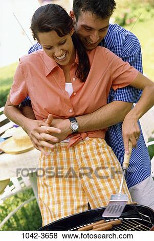 people, couple, Hispanic, cooking, picnic, laughing, outdoors View Large Photo Image Stock Photo - people, couple, Hispanic, cooking, picnic, laughing, outdoors. Fotosearch
