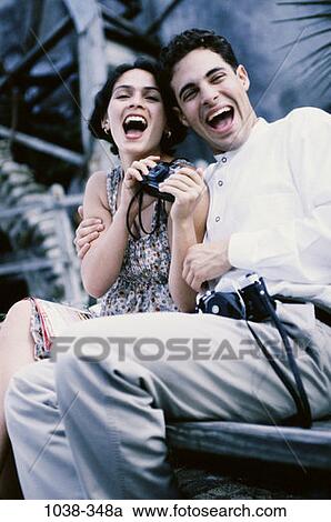 people, couple, Hispanic, laughing, outdoors, vacations, joyous View Large Photo Image Stock Image - people, couple, Hispanic, laughing, outdoors, vacations, joyous. Fotosearch