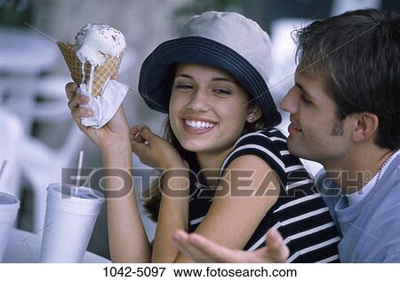 people, couple, ice cream, cafe, outdoors, affection, teens View Large Photo Image Stock Photo - people, couple, ice cream, cafe, outdoors, affection, teens. Fotosearch