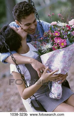 people, couple, outdoors, young adult, Young couples outdoors View Large Photo Image Stock Image - people, couple, outdoors, young adult, Young couples outdoors. Fotosearch
