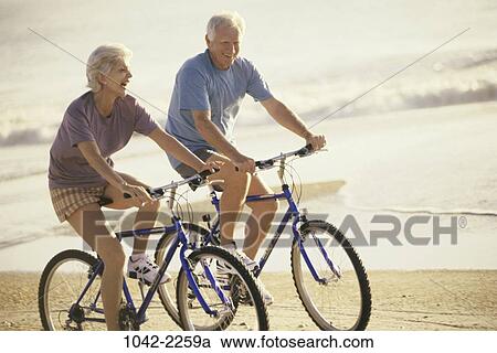 people, couple, senior, bicycle, outdoors, sports View Large Photo Image Stock Image - people, couple, senior, bicycle, outdoors, sports. Fotosearch