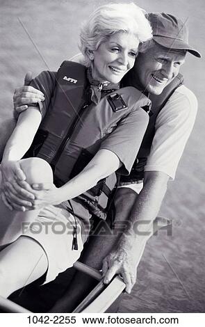 people, couple, senior, boating, lifestyles, outdoors, smile View Large Photo Image Stock Photography - people, couple, senior, boating, lifestyles, outdoors, smile. Fotosearch