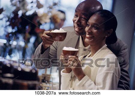 people, couple, toasting, coffee, drinking, pearls, cafe View Large Photo Image Stock Image - people, couple, toasting, coffee, drinking, pearls, cafe. Fotosearch
