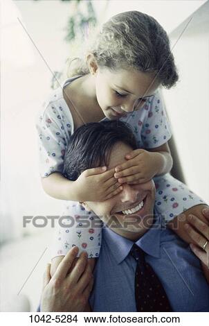 people, covering, Middle-aged, carrying, family, father, mischievous View Large Photo Image Picture - people, covering, Middle-aged, carrying, family, father, mischievous. Fotosearch