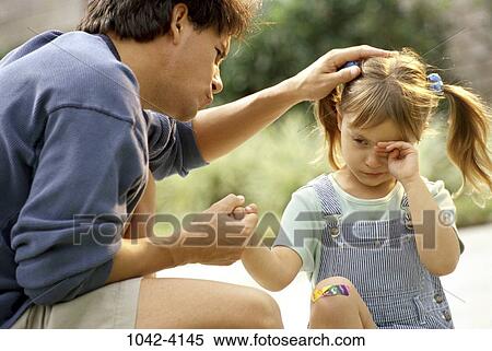people, crying, injury, outdoors, nurturing, family, comforting View Large Photo Image Stock Photography - people, crying, injury, outdoors, nurturing, family, comforting. Fotosearch