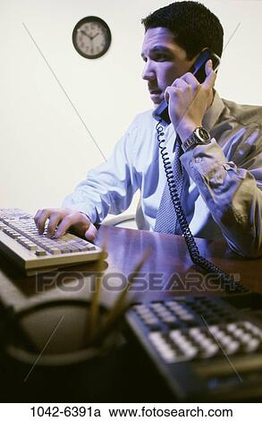 people, desk, telephone, computer, phone, business View Large Photo Image Stock Image - people, desk, telephone, computer, phone, business. Fotosearch