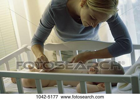 people, diaper, sleeping, mother, baby, crib View Large Photo Image Stock Photo - people, diaper, sleeping, mother, baby, crib. Fotosearch