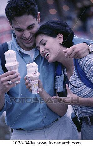 people, eating, smiling, couple, Hispanic, ice cream, watch View Large Photo Image Stock Image - people, eating, smiling, couple, Hispanic, ice cream, watch. Fotosearch