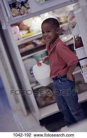 people, eating, smiling, door, milk, refrigerator, holding View Large Photo Image Stock Image - people, eating, smiling, door, milk, refrigerator, holding. Fotosearch