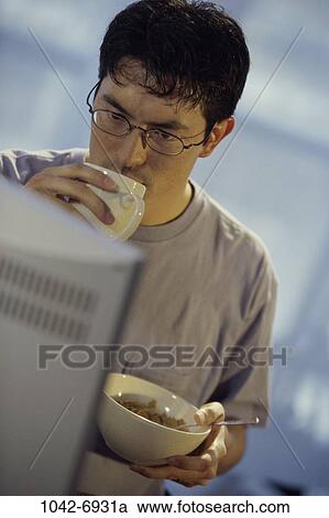 people, eating, staring, computer, breakfast, bowl View Large Photo Image Stock Image - people, eating, staring, computer, breakfast, bowl. Fotosearch