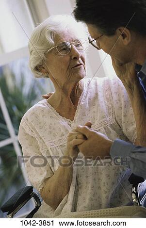 people, eyeglasses, mother, wheelchair, family, touching View Large Photo Image Stock Image - people, eyeglasses, mother, wheelchair, family, touching. Fotosearch
