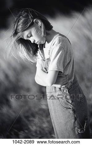 people, girl, concepts, contemplation, serious, lonely, sad View Large Photo Image Stock Photo - people, girl, concepts, contemplation, serious, lonely, sad. Fotosearch
