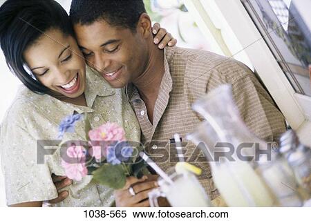 people, glass, smiling, couple, flowers, outdoors, dining out View Large Photo Image Stock Photography - people, glass, smiling, couple, flowers, outdoors, dining out. Fotosearch