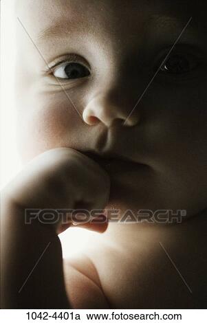 people, hand, face, baby, thinking, fist, infant View Large Photo Image Stock Image - people, hand, face, baby, thinking, fist, infant. Fotosearch