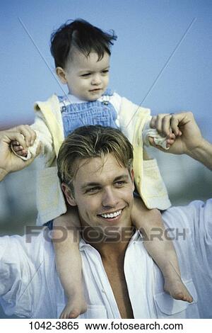 Stock Photography - people, hands, smiling, riding, holding, outdoors, carrying. Fotosearch