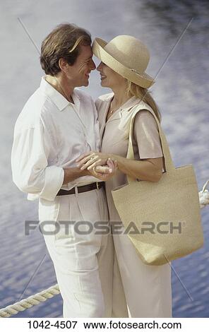 people, hands, water, ripples, smiling, rope, hat View Large Photo Image Stock Photo - people, hands, water, ripples, smiling, rope, hat. Fotosearch