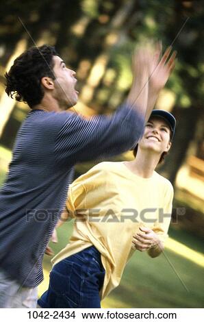 people, hat, couple, Hispanic, football, lifestyles, outdoors View Large Photo Image Picture - people, hat, couple, Hispanic, football, lifestyles, outdoors. Fotosearch