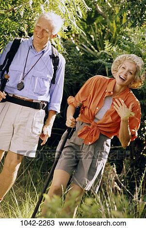 people, hat, walking, couple, senior, backpack, lifestyles View Large Photo Image Stock Image - people, hat, walking, couple, senior, backpack, lifestyles. Fotosearch