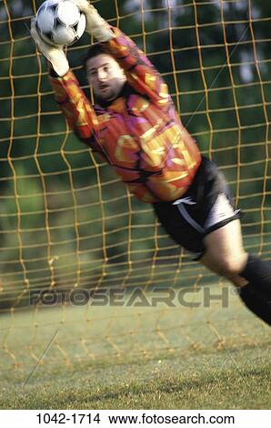 people, Hispanic, ball, outdoors, sports, net View Large Photo Image Picture - people, Hispanic, ball, outdoors, sports, net. Fotosearch