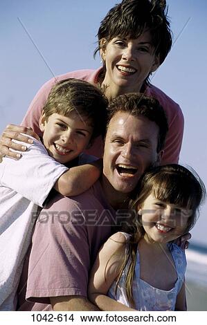 Picture - people, Hispanic, beach, outdoors, joyous, unity, family. Fotosearch