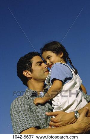 people, Hispanic, holding, outdoors, nurturing, Middle-aged, hugging View Large Photo Image Stock Photo - people, Hispanic, holding, outdoors, nurturing, Middle-aged, hugging. Fotosearch