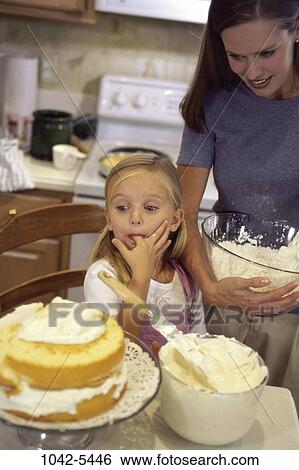 people, home, mother, cake, family, anticipation, food View Large Photo Image Stock Photograph - people, home, mother, cake, family, anticipation, food. Fotosearch