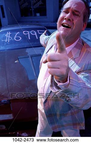 people, industry, suit, car, pointing, outdoors View Large Photo Image Stock Image - people, industry, suit, car, pointing, outdoors. Fotosearch