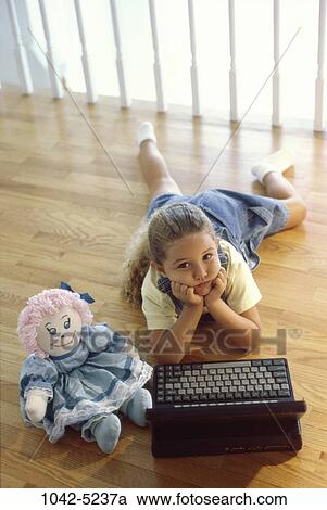 people, keyboard, computer, laptop, floor, doll, girl View Large Photo Image Stock Image - people, keyboard, computer, laptop, floor, doll, girl. Fotosearch